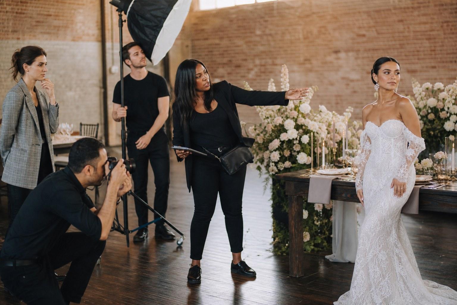 Wedding planner directing a styled shoot for a portfolio